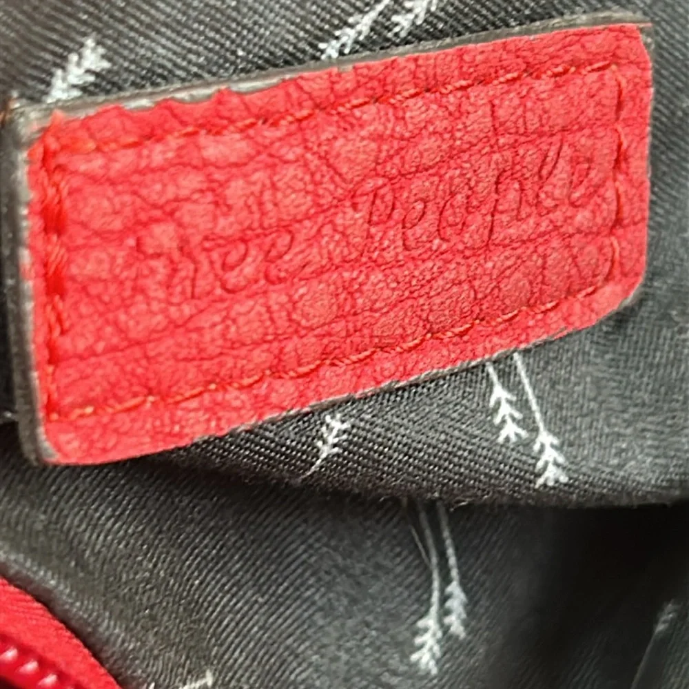 Free People red faux pebble leather travel zip bag.  Red. Approximately 11”X14”.